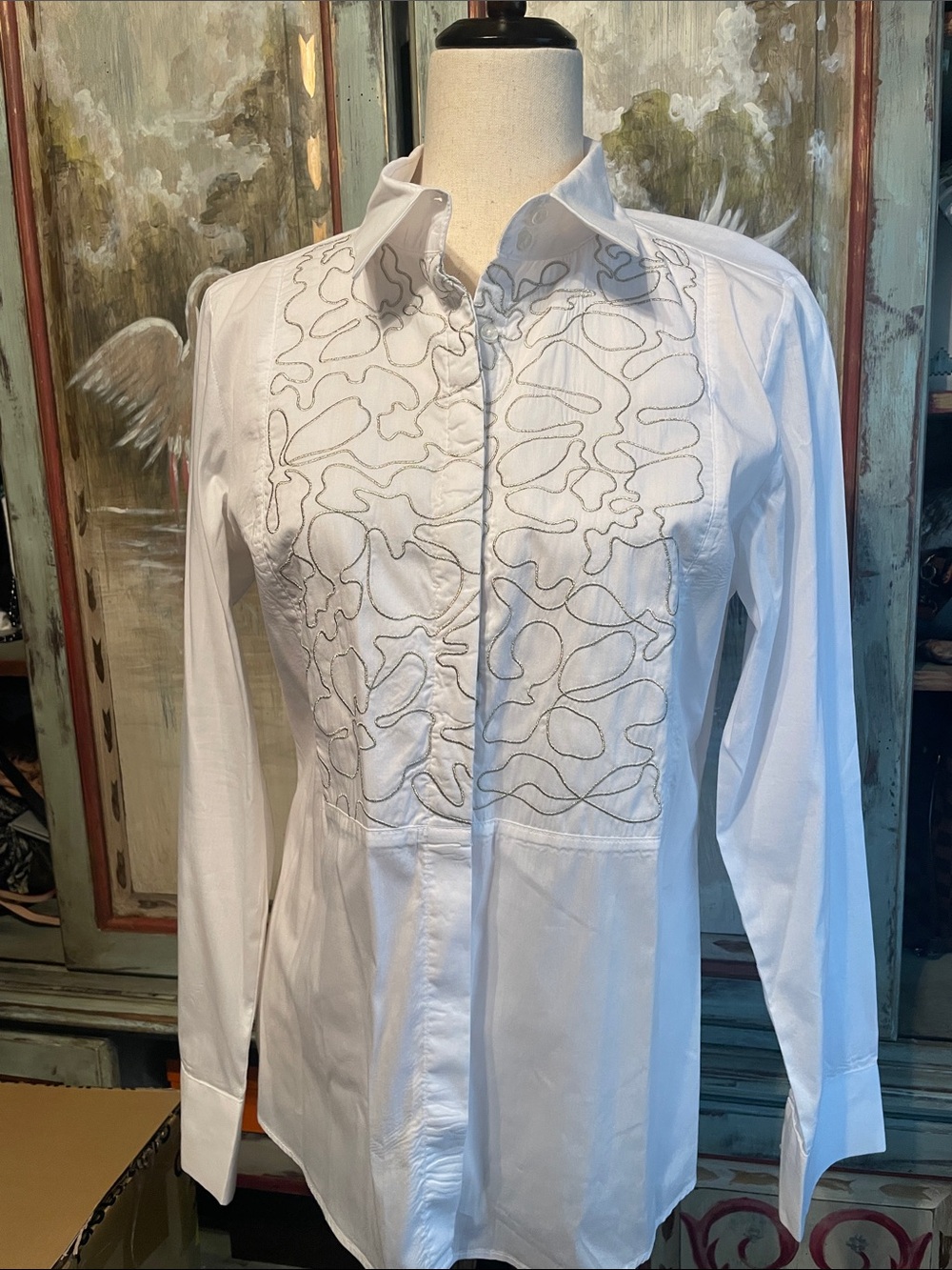 White Embroidered Long-Sleeve Women's Blouse with gold accent